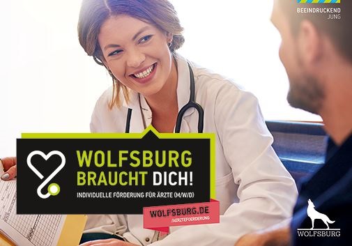 Kampagnenmotiv mit der Aufschrift "Wolfsburg braucht Dich! - Ärztin im Gespräch mit einem Patienten