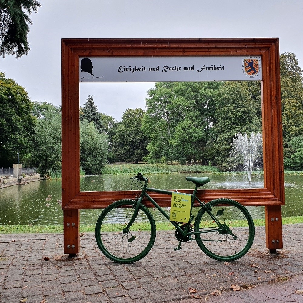 Green bike at the castle pond in Fallersleben