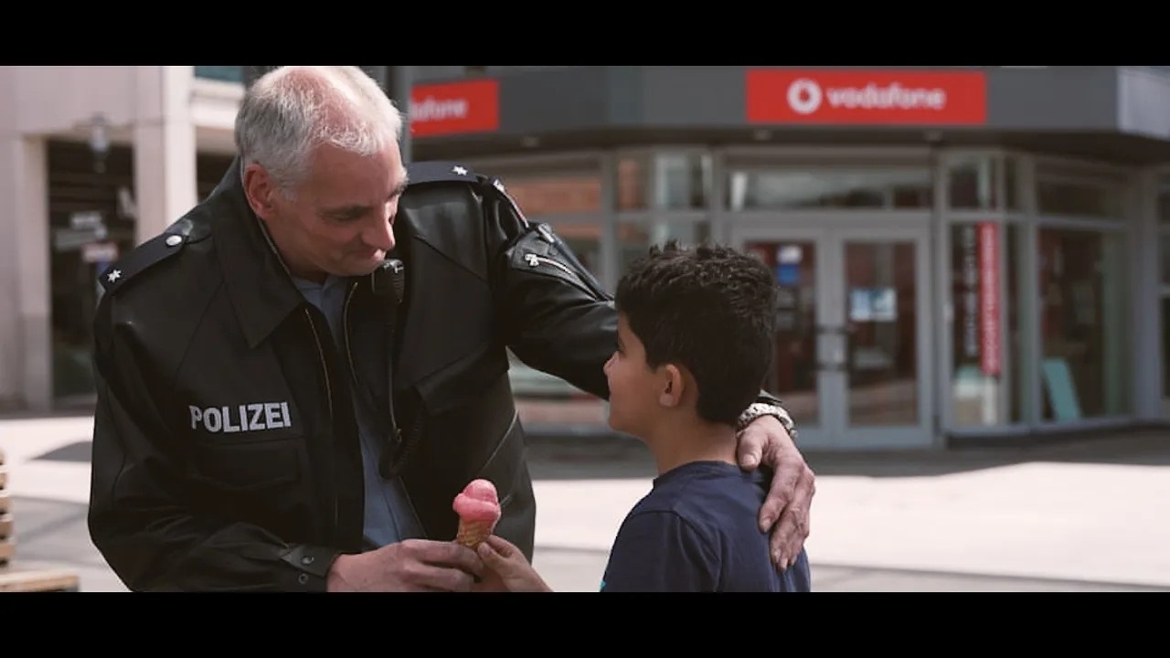 A policeman and a little boy